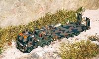 SCANIA 143h SZM mit Mehrzweckaufleger und 7t Ladekran der belgischen Army von 2000